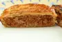 Petites tourtes de pâte feuilletée garnies d'une préparation au boeuf épicé ou saumon-lardons.