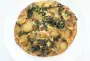 Quiche sans pâte aux pommes de terre et épinards frais.