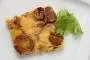 Omelette pommes de terre, oignon et lardons cuite au four.