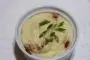 Purée moelleuse chou-fleur et pommes de terre aux éclats de jambon fumé.